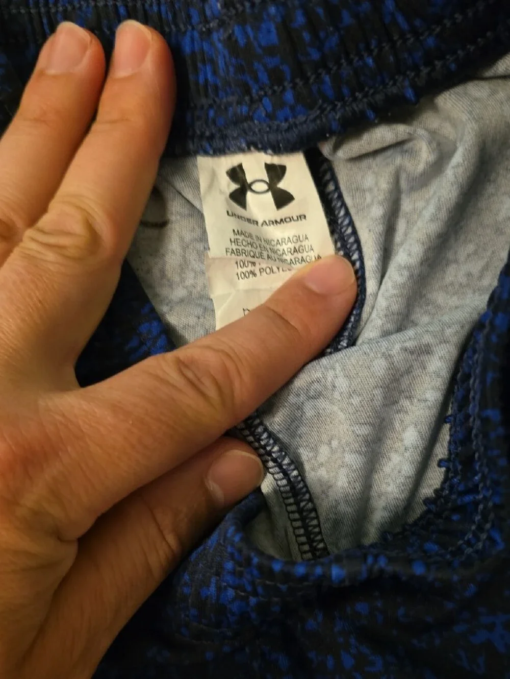 Under Armour Boy’s Navy Blue Athletic Shorts with Orange Logo